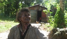 Title: La Bruja Caption: La Bruja (the witch) is popular among anxious villagers for her money-making magic in a Dominican coastal town undergoing rapid development.
