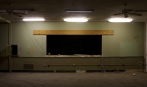 Title: Factory Tour Caption: This photograph was taken inside a building that was once a mattress factory and more recently a storage facility for the owners of one of Philadelphia's many dollar stores. The poorest large city in the nation, Philadelphia was hit hard by deindustrialization and continues to suffer. Today, the Kensington neighborhood where this factory stands is part of Pennsylvania's First Congressional District and the second hungriest place in America.  
