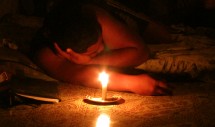 Title: Cyclone night (Tongatapu, Kingdom of Tonga, 2012/2/14) Caption: In the afternoon when the warning of Cyclone Jasmine was given to Tongatapu Island, the electric power was cut. Since the power wasnt recovered until evening because of continuing the heavy rainstorm, Atu Falevai prepared candles with a practiced hand. Although Atu usually used a mobile phone and a computer at night, they slept early on this day without complains. Under the candle light, I felt it was not bad like this night, remembering the government, the electric power company and the media of Japan which receive criticism on a problem of the nuclear power plant after a big earthquake in Japan.  