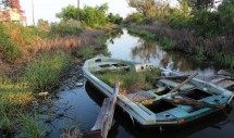 Category: PLACE
Title: Holding On
By: Julie Maldonado
Caption: While this native community works to save their land and culture, their homeland is being washed out to sea, taking with it their land, livelihoods, and way of life. 
Isle de Jean Charles, Louisiana. April 2012.