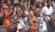 Title: "Chiefly Revel" Caption: Young attendees celebrate the wedding of a Xhosa chief in the former Ciskei Homeland of the Eastern Cape, South Africa. Though historically diluted through colonial legislation that did not recognize chiefs, traditional authority in the Ciskei is ever-present in many rural areas.