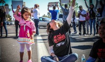 Title: Undocumented & Unafraid (Phoenix, AZ, March 20, 2012) Caption: One of six undocumented youth was arrested for civil disobedience in Phoenix, Arizona for protesting the DHS Secure Communities policy and the work of Sheriff Joe Arpaio that are separated families through record numbers of detentions and deportations. One of the undocumented youth arrested explains, "I am afraid of being out here and doing this, you know, being arrested. But I am willing to face that fear because that is the fear that is in our community everyday. It is in our hands. Everything that this fear takes away from us, we are letting it go . . . to gain our dignity. The same thing that they use to keep us down, it is the same thing we will use to get back up."