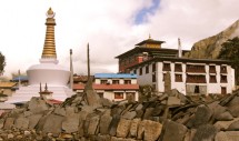 Title: Above the Clouds, Below the Gods Caption: Pilgrims climb steep hills through the green trees, white water and floating clouds to reach Tengboche Monastery (3870 m), where Gods are closer. This picture of the monastery was taken in the morning of September 19, 2011, the day after an earthquake hit the region.