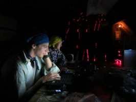 E Cory Sills making 3D scan of artifacts in the Belize field lab. Photo courtesy H McKillop