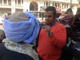 Blogger documenting sit in of small farmers on March 14 2011. Photo courtesy Yasmine Ahmed