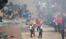 Aftermath of the 2013 boston marathon bombing show people helping others from the scene. Photo courtesy of Aaron "tango" Tag