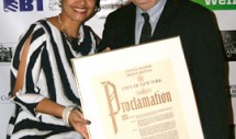 Sam Beck receives a proclamation from New York City Council Member Diana Reyna in recognition of his service to North Brooklyn communities. Photo courtesy Christian Peguero