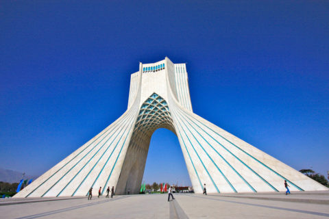 Azadi Tower backed by a clear sky.