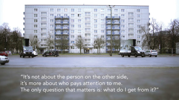 lanscape photo of an 8-story apartment building with a mostly empty parking lot in front. Text at the bottom of the photo reads, "It's not about the person on the other side, it's more about who pays attention to me. The only question that matters is: what do I get from it?"