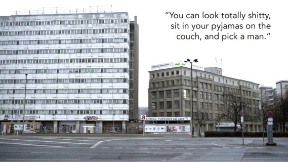 A photo of two office buildings taken from across the street. There are no cars or people in the photo, and no leaves on the tree in the median of the road. The text in the photo, a quote from an interlocutor, reads: "You can look totally shitty, sit in your pyjamas on the couch, and pick a man."