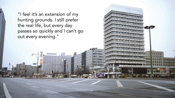 A photo of a four-lane, two-way street, with a row of office buildings fading into the distance. The text in the photo, a quote from an interlocutor, reads, "I feel it's an extension of my hunting grounds. I still prefer the real life, but everyday passes so quickly and I can't go out every night."