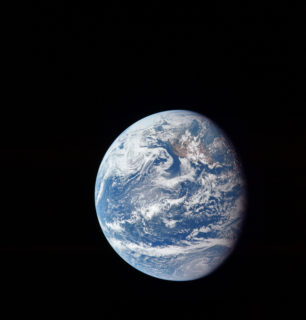 The planet Earth floating alone in outer space.