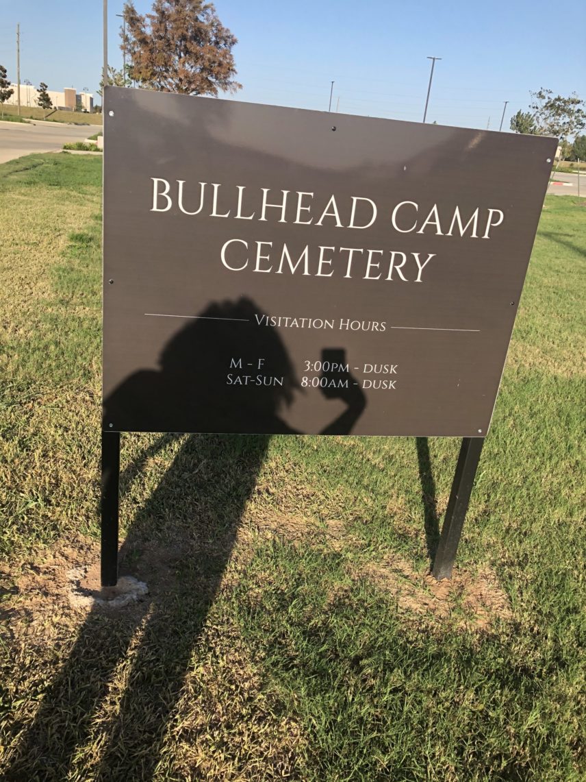 Photograph of a large sign for Bullhead Camp Cemetery