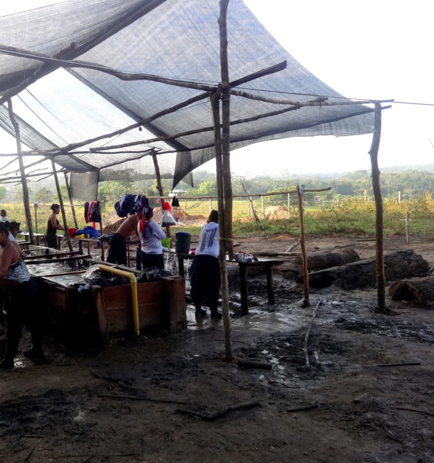 Photograph of temporary running water container built in a disarmament camp in Colombia