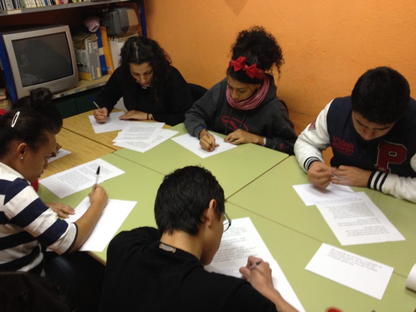 Photograph of people sitting at a table