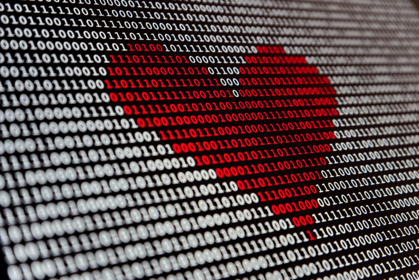 Image of a heart rendered in ones and zeroes