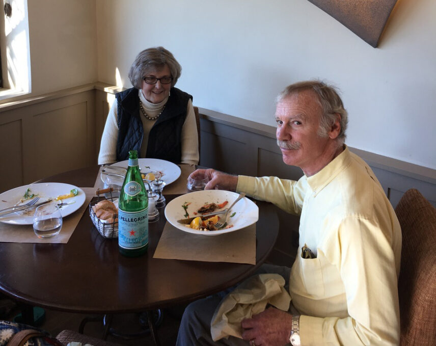 Photograph of two people sitting at a table