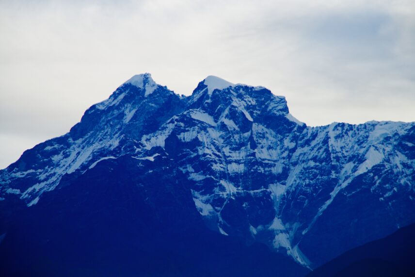 A photograph of a blue-tinted mountain.