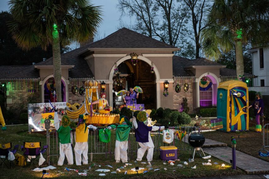 Photograph of a yard decorated for Mardi Gras in an LSU theme