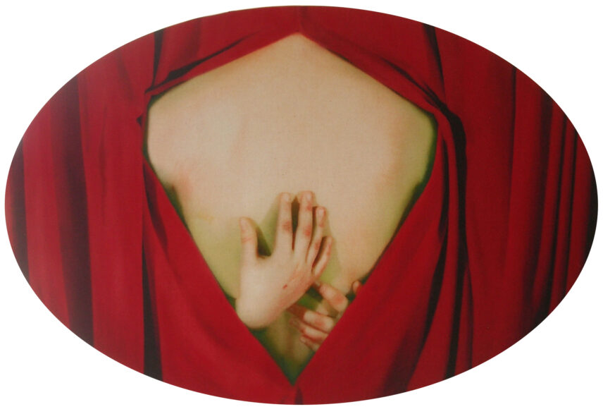 Photograph of a person's back and hands
