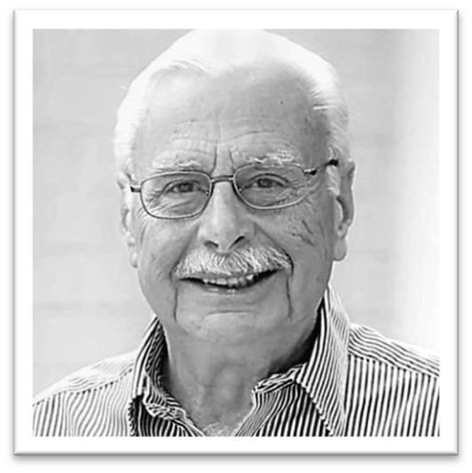 Headshot of a an older man