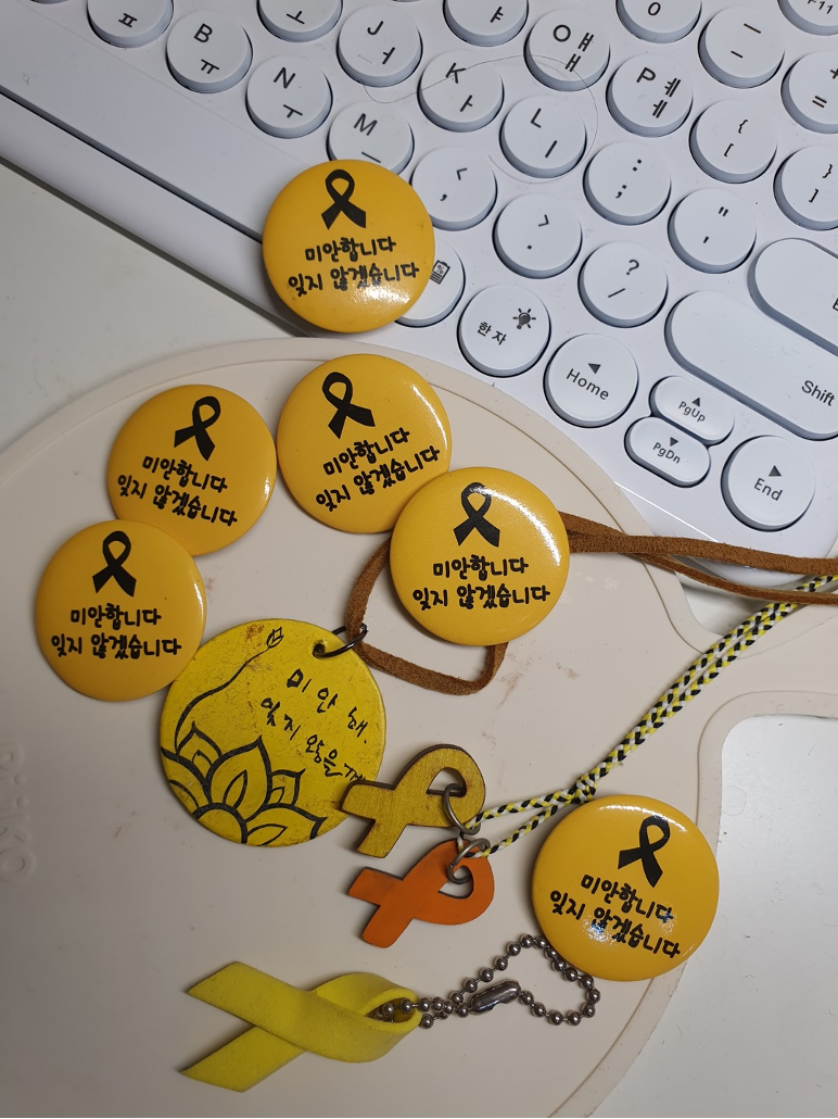 Photograph of yellow memorabilia commemorating the youths lost during the 2014 ferry disaster.