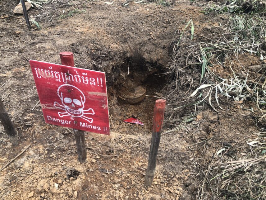 Figure 1. Anti-vehicle mine in a Cambodian minefield, before its destruction.