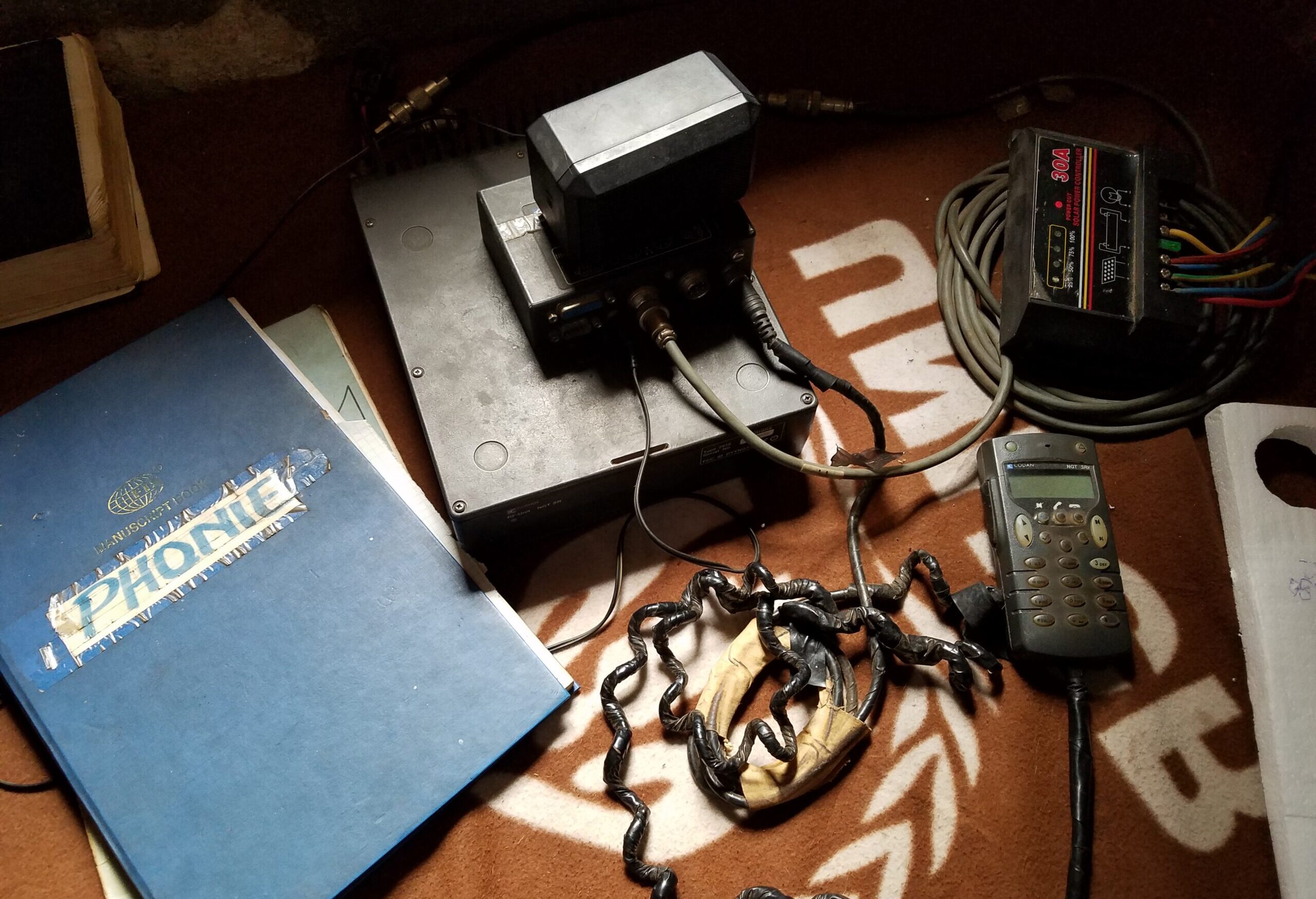 The desk of a radiophonie operator, based in the church of a small town in northeastern Congo. This church has had a phonie for decades, inspiration for the humanitarian network.
