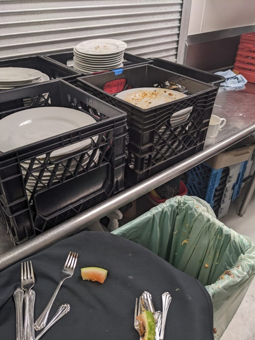 The last bits from tables brought back to the bussing station.