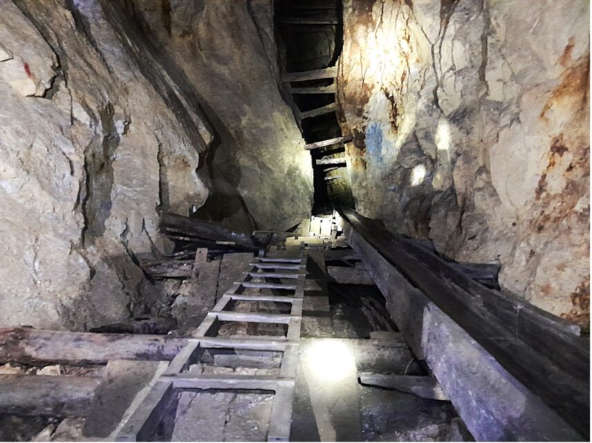 Ladders installed in the heart of the hill connecting mining operations located at different altitudes.