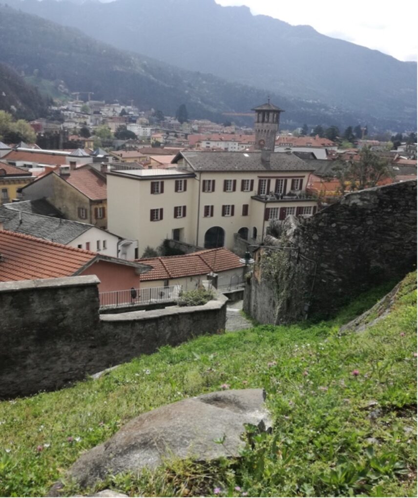 Hiding on a hill in Bellinzona while waiting for my brother to reach my apartment in Basel.
