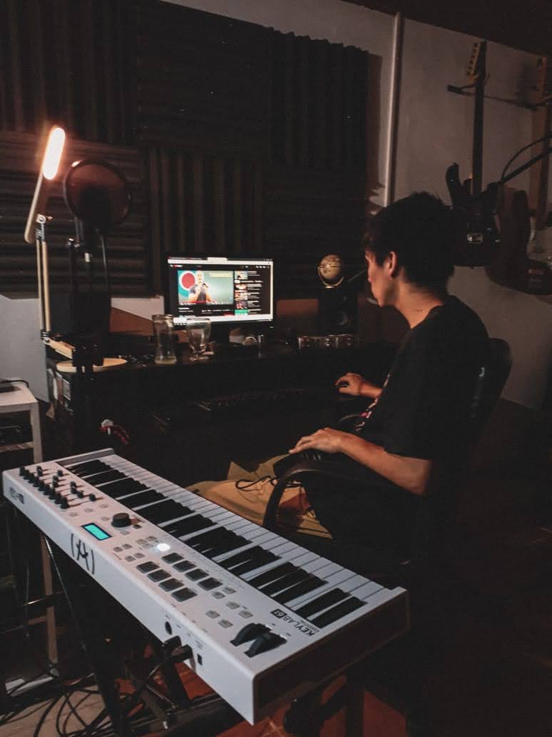 Agustín Lino working in his home studio.