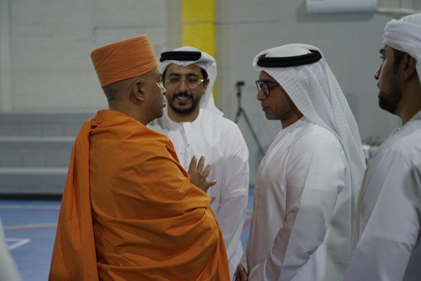 Brahmaviharidas Swami discussing security arrangements with local leaders.