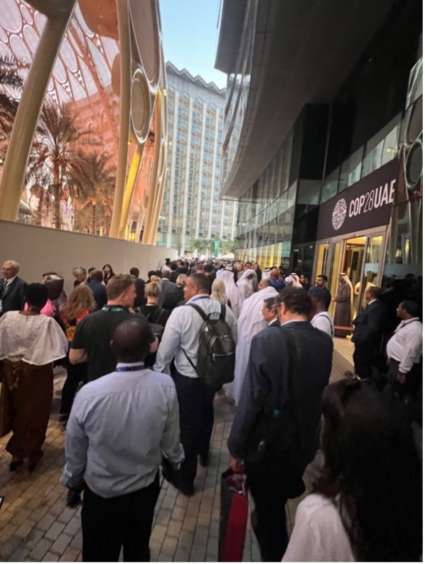 Figure 4. A main walkway in Expo City, COP28 in Dubai, filled with people.